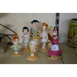 A Beswick ceramic Flintstone set, to include Fred, Wilma, Betty, Rubble, Barney, Bam Bam,