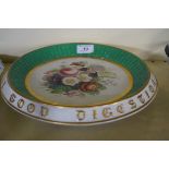 A 19th Century continental bread plate having hand painted floral decoration with Italian motto to