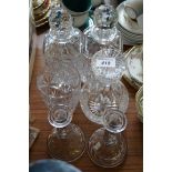 A mixed lot of assorted glassware to include cut glass decanter, candlesticks etc.
