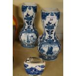 A pair of Delft blue and white vases, of double gourd form,