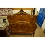 A good quality French kingwood double bedstead.