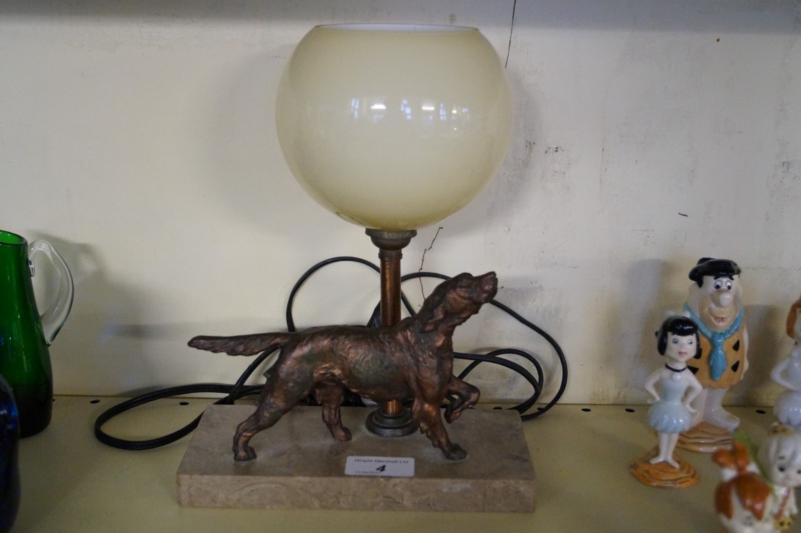 Art Deco table lamp modelled with a gilt spelter setter, raised on marble plinth base.