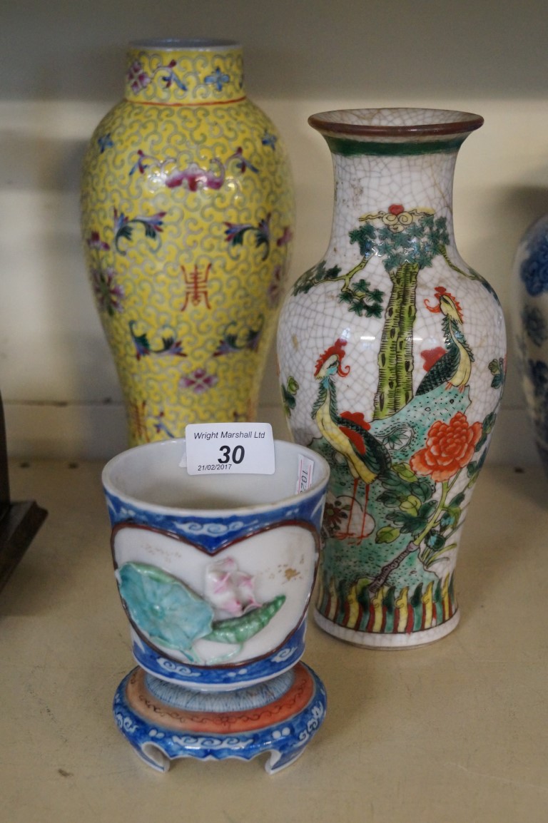 Three pieces of assorted Chinese pottery to include yellow glazed vase, crackle glazed vase etc.