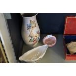 Three pieces of Art Deco style ceramics to include a large Arthur Wood vase with relief floral