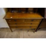 An Edwardian dressing table having two short over two long drawers.