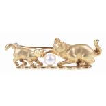 A 9ct gold and pearl novelty brooch Realistically modelled,