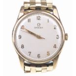 Omega: A 9ct gold manual wind bracelet wristwatch The circular white dial,