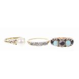 An early 20th century gem-set five stone ring With alternating circular-shaped garnets and opals,