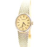 Zenith: A Ladies 14ct gold quartz bracelet wristwatch The oval gold tone dial,