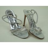 Gina: A pair of silver leather heeled sandals Size 6,