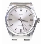 Rolex: A stainless steel Oyster Precision bracelet wristwatch The circular silvered dial,