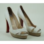 Christian Louboutin: A pair of white leather peep toe heeled shoes Size 38½,