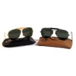 Two pairs of Vintage Ray-Ban Bausch & Lomb sunglasses To include a pair of bullethole shooters