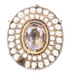 A Georgian gem-set seed pearl ring The central stone, possibly a topaz,