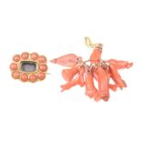 A coral charm cluster Possibly Italian, the Figa charm with a yellow metal chain,