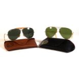 Two pairs of Vintage Ray-Ban Bausch & Lomb sunglasses The first a pair of Bullethole Shooters