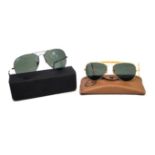 Two pairs of vintage Ray-Ban Bausch & Lomb sunglasses To include a pair of outdoorsman aviators, 12.