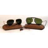 Two pairs of vintage Ray-Ban Bausch & Lomb sunglasses To include a pair of Outdoorsman driving