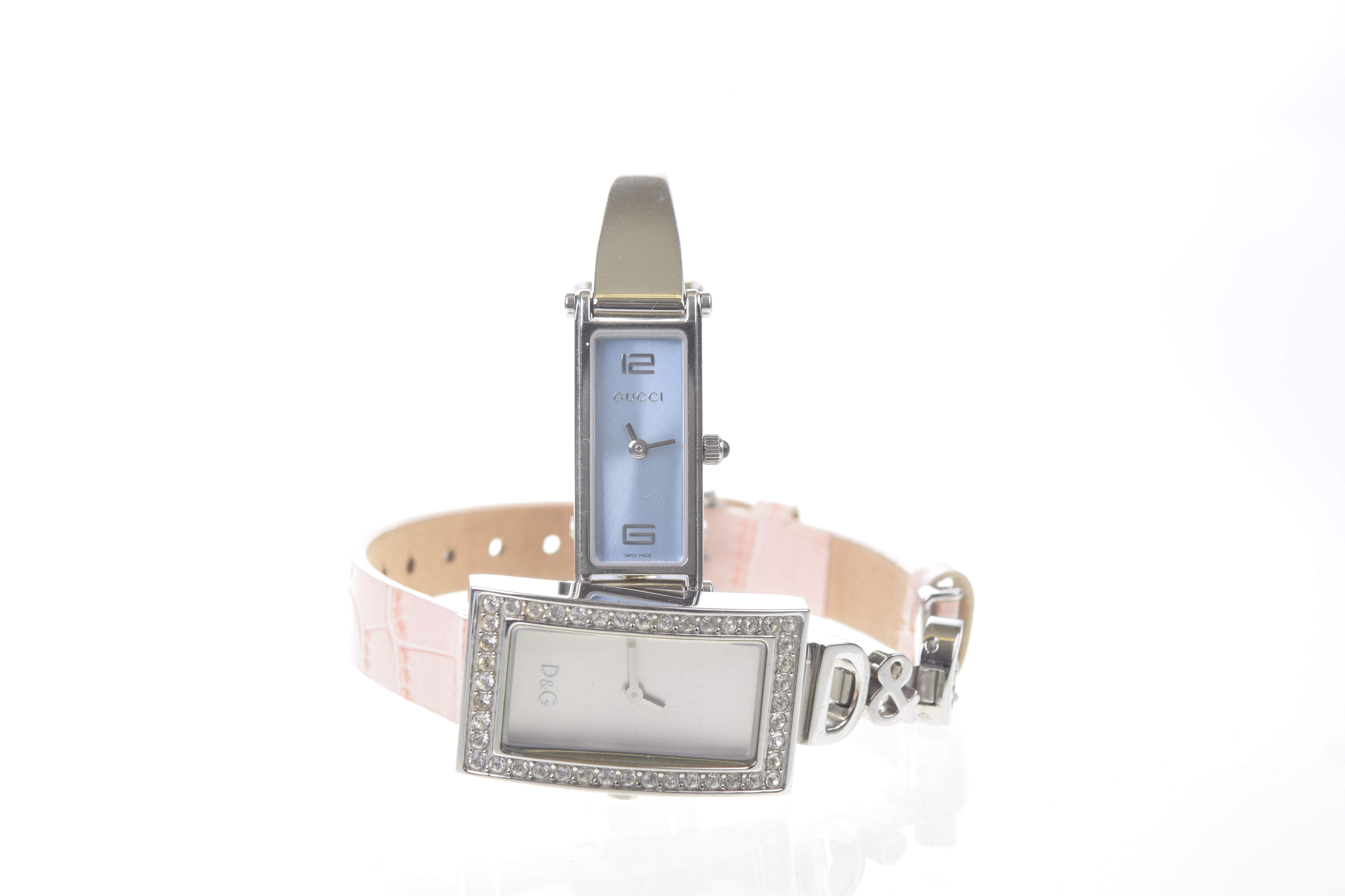 Gucci: A Ladies quartz bracelet wristwatch The rectangular pale blue dial,