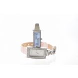 Gucci: A Ladies quartz bracelet wristwatch The rectangular pale blue dial,