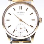 Griffon: A 9ct gold manual wind presentation watch The circular white dial,