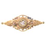 A Victorian Etruscan revival diamond set sentimental brooch Of navette form with applied rope twist,