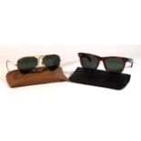 Two pairs of vintage Ray-Ban Bausch & Lomb sunglasses To include a pair of tortoiseshell wayfarer