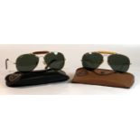 Two pairs of Vintage Ray-Ban Bausch & Lomb sunglasses To include a pair of gold frames aviator