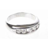 A diamond five stone ring The round brilliant-cut diamonds, to a white metal shank stamped 750,