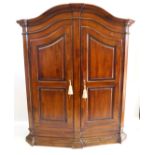 A French period style fruitwood armoire,