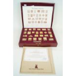 A cased set of silver gilt medals titled 'The First International Bank Ingot Collection' Comprising