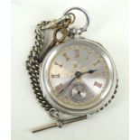 A late Victorian hallmarked silver pocket watch With central filigree decoration and gilt Roman