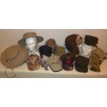 A collection of approximately fifty two assorted hats To include a Pinewood murmask,