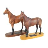 Two Beswick models of horses To include 'Red Rum', raised on oval wooden plinth base,