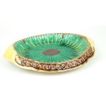 A Victorian Majolica bread plate Of oval form relief decorated with corn sheaves,