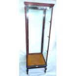 A mahogany four sided glazed display cabinet, early 20th Century Bears ivorine label J. C.