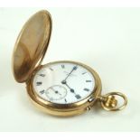 A 9ct gold full hunter pocket watch Of typical plain form, the face marked J.W.