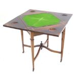 An Edwardian marquetry inlaid rosewood envelope card table The revolving quarter sectioned square