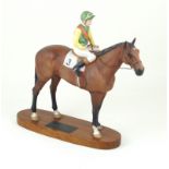 A Beswick horse 'Nijinsky Lester Piggot up' Raised on oval wooden plinth base,