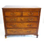 A George III boxwood strung and mahogany cross banded oak chest of drawers The rectangular top with