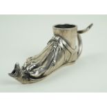 A Sterling silver oil lamp Modelled in the form of a foot with serpent head being the brush lighter,