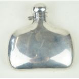A George V hallmarked silver hip flask Of squat plain form, having central engraved family motto,