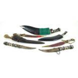 A collection of Ethnic weaponry To include three 20th Century kukri knifes,