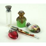 Five Edwardian and later perfume bottles To include a hand-painted example in the form of a love