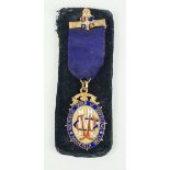 A 9ct gold and enamelled medal 'Independent order of oddfellows Manchester unity', total weight 16.