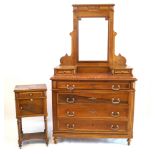 A French walnut dressing chest and bedside cabinet The dressing chest having a raised mirror (plate