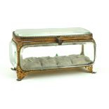 A Victorian gilt metal and glass jewellery casket Having five glass panels,