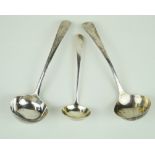 Three Georgian hallmarked silver ladles Each of plain form, one example with engraved family motto,