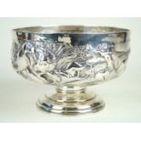 A fine quality Edward VII hallmarked silver pedestal bowl Finely repousse decorated with dogs