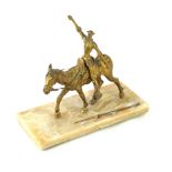 A gilt brass figure group 'Don Quixote' Modelled on horseback, raised on onyx plinth base,